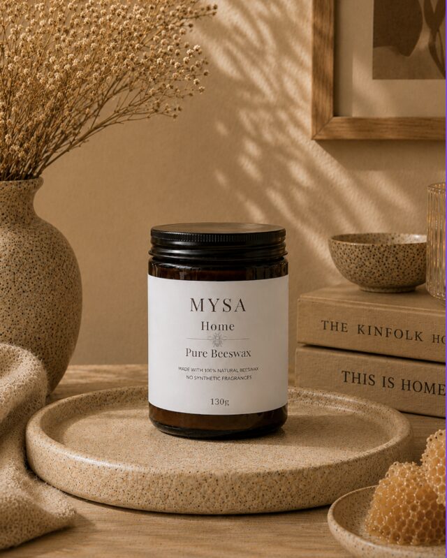 MYSA Pure Beeswax candle styled with honeycomb